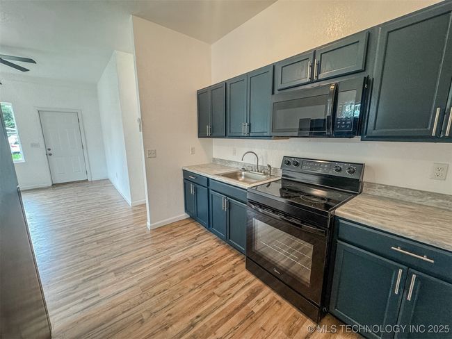 916 Coy Ave, Home with 3 bedrooms, 2 bathrooms and null parking in Tahlequah OK | Image 12