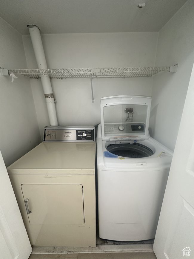 Washroom with separate washer and dryer | Image 11