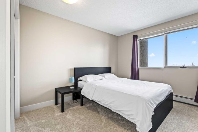 8 - 122 Village Heights Sw, Home with 2 bedrooms, 1 bathrooms and 2 parking in Calgary AB | Image 12