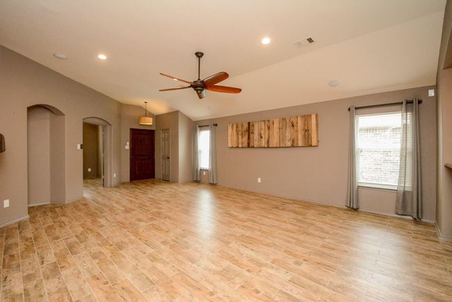 The main living area offers plenty of space and natural light. | Image 6