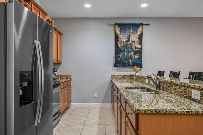 8963 Coco Palm Rd, Townhouse with 4 bedrooms, 3 bathrooms and null parking in KISSIMMEE FL | Image 6
