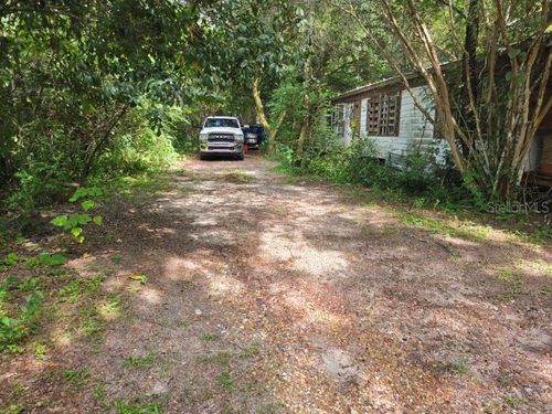 4542 Firelane Rd, ZEPHYRHILLS, FL, 33541-2215 | Card Image