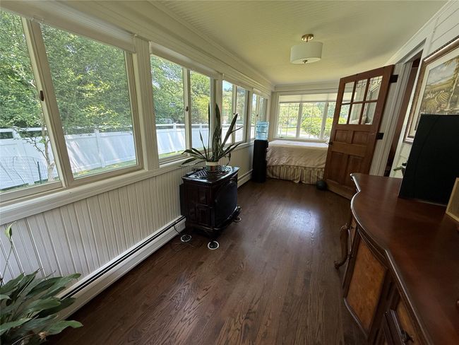 Sun-filled enclosed porch for year-round use. | Image 10