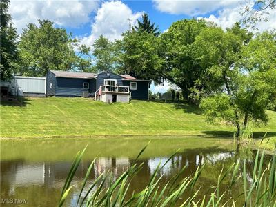 View of the back of the house from pond | Image 3