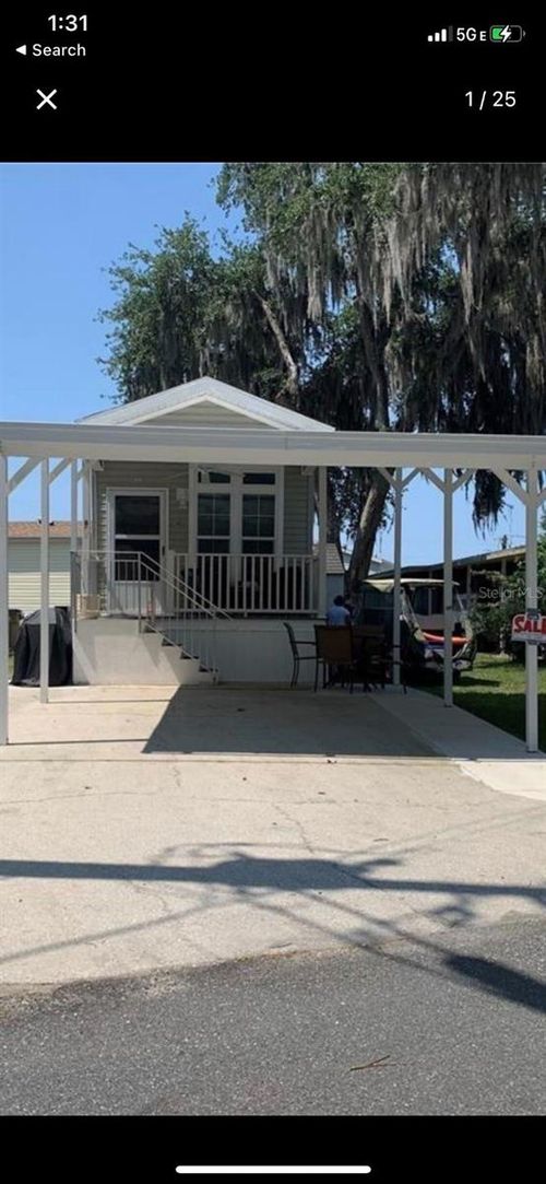 699 Cindi Ave, LEESBURG, FL, 34788-2417 | Card Image