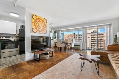 Spacious living room with sliders to balcony | Image 1