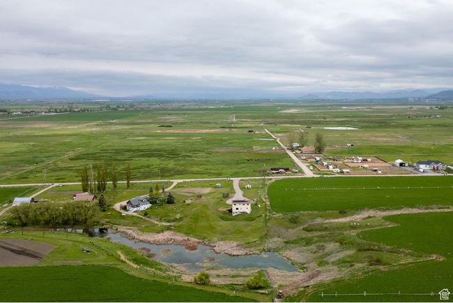 Aerial overview of property's location with rural landscape and a mountain backdrop | Image 29