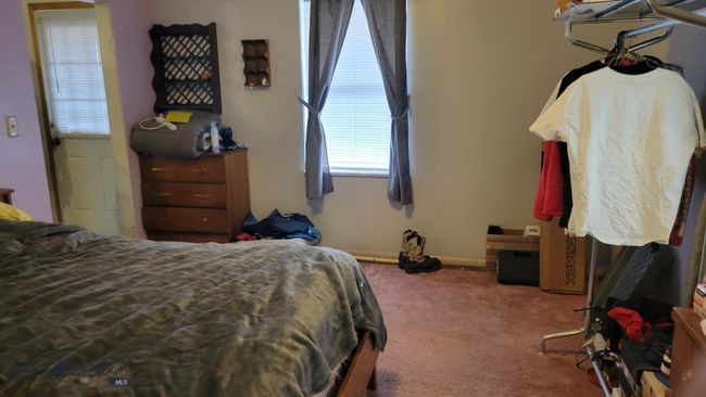 View of carpeted bedroom | Image 10