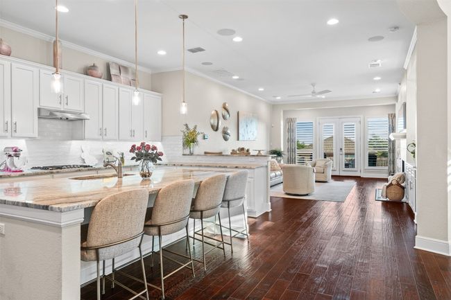 Thoughtfully designed with up to 60k in improvements like spray foam insulation, a tankless water heater, stainless steel appliances, and a whole-home water softener, Carrier Infinity AC with whole-home filtration. | Image 4