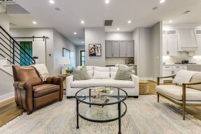 The living room also features a dry bar with a built-in mini fridge—perfect for entertaining. | Image 17