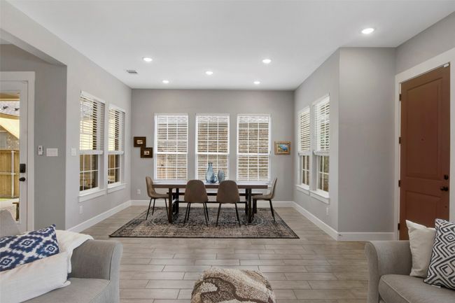 Dining room featuring recessed lighting, wood finish floors, and baseboards | Image 7