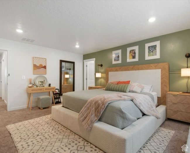 Bedroom with carpet floors, recessed lighting, and baseboards | Image 11