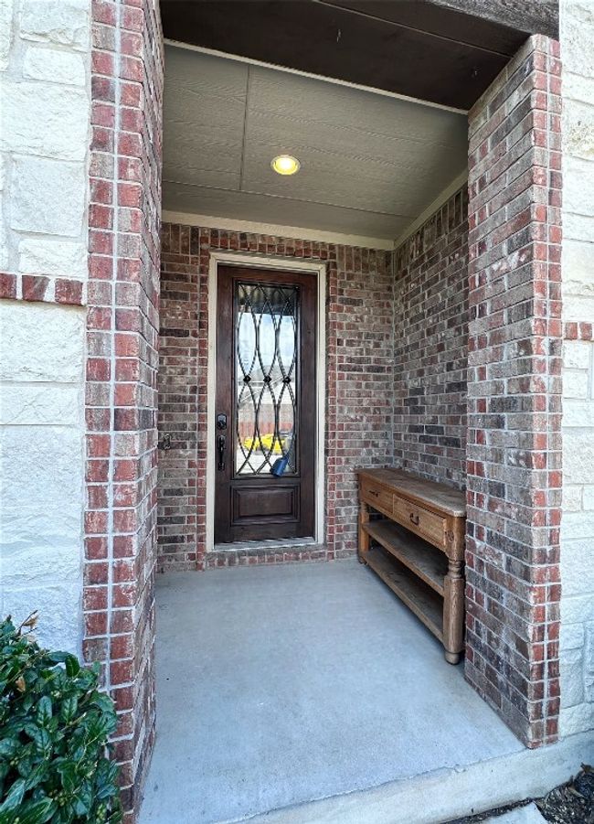 Entrance to property with brick siding | Image 4