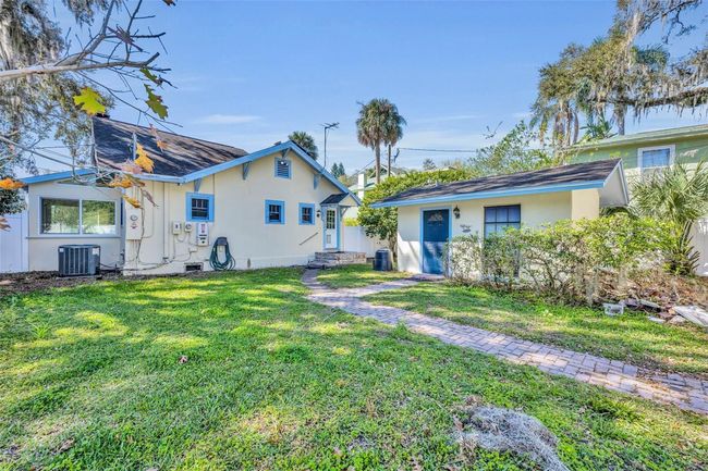 Back view of bungalow, side sunroom, detached one bedroom apartment | Image 20
