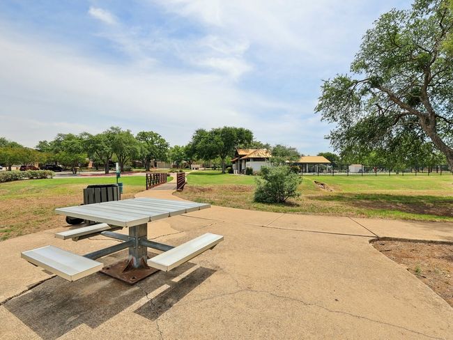 View of home's community with a lawn | Image 37