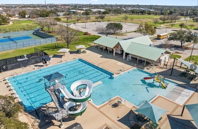 Pool complete with tubular slide and swim lanes walking distance to Milburn Park! | Image 32