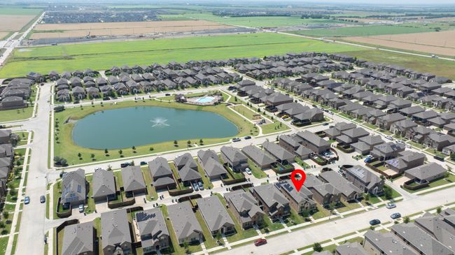 Aerial overview of property's location featuring nearby suburban area and a nearby body of water | Image 34