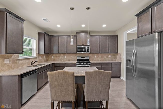 3015 Button Cir, House other with 4 bedrooms, 3 bathrooms and null parking in Loganville GA | Image 18