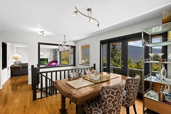 Dining room with french doors, wood finished floors, and a healthy amount of sunlight | Image 7