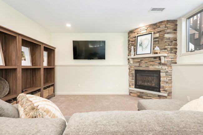 Space to unwind watching TV or just cozy up to the fire. | Image 35