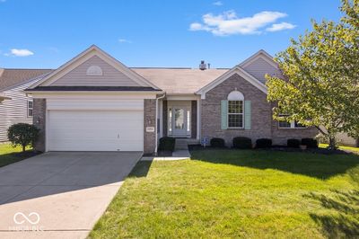 Main level living with a water view and over 2k square finished basement awaits its new owners! | Image 1