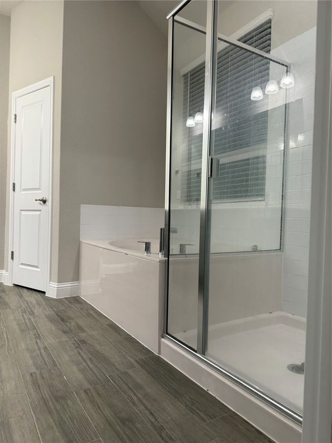 Bathroom with shower with separate bathtub | Image 7