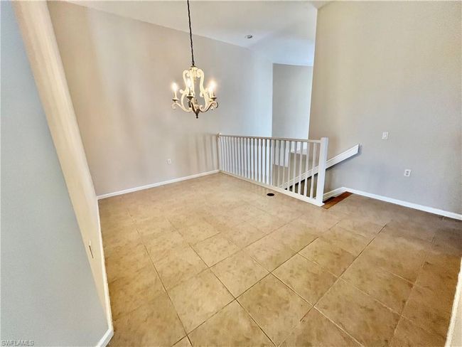 Dining Room view toward entry stairs now the furniture has been moved out | Image 8