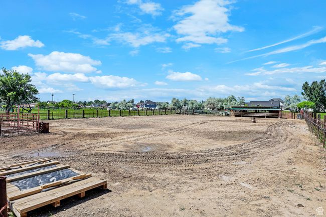 View of yard featuring an outdoor riding arena and a view of countryside | Image 40