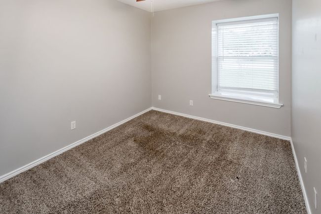 Spare room with carpet floors and a ceiling fan | Image 22