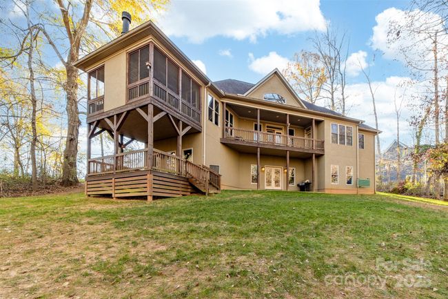 Private backyard. Direct access to the fully finished basement. Sublime porches, Wood Buring fireplace on the screened porch. | Image 8