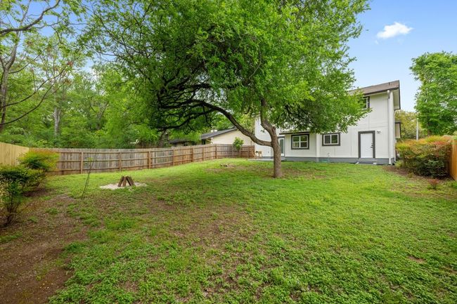 View of yard with a fenced backyard | Image 24