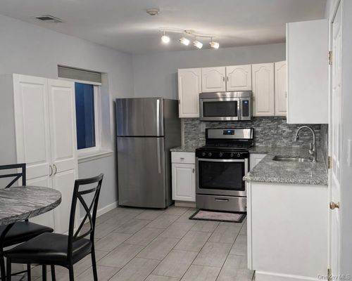 83-83 Gauguin Ct, Middle Island, NY, 11953-2002 | Card Image