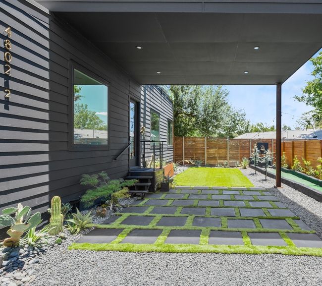 View of fenced backyard | Image 6