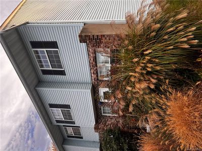 View of property exterior at dusk | Image 1