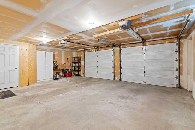 76 Coach Gate Way Sw, House other with 3 bedrooms, 2 bathrooms and 4 parking in Calgary AB | Image 35