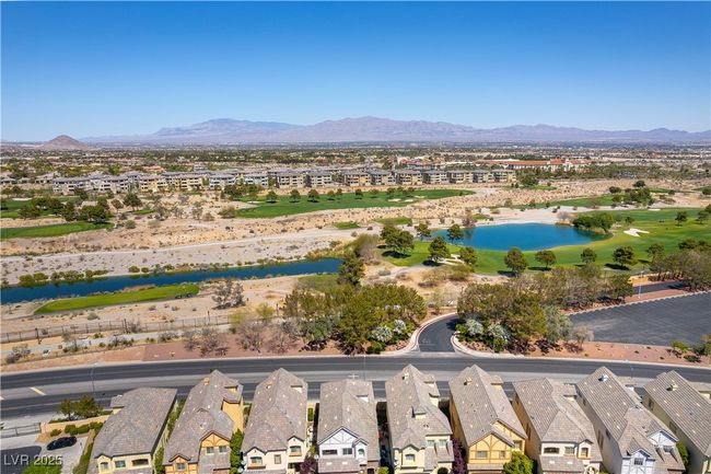 Drone / aerial view featuring a water and mountain view and a residential view | Image 41