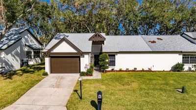 1457 Pheasant Creek Drive, House other with 2 bedrooms, 2 bathrooms and null parking in PALM HARBOR FL | Image 1