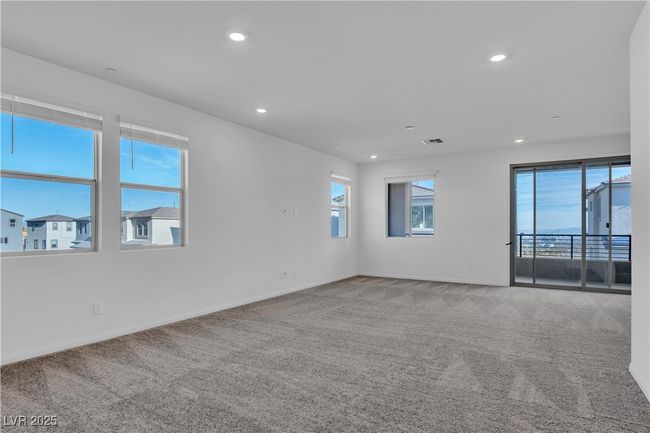 Carpeted spare room featuring recessed lighting and baseboards | Image 11