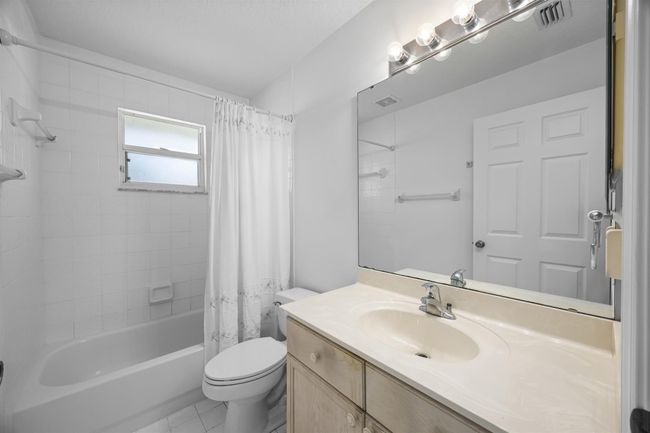 1040 Egret Circle Circle N, House other with 3 bedrooms, 2 bathrooms and null parking in Jupiter FL | Image 26