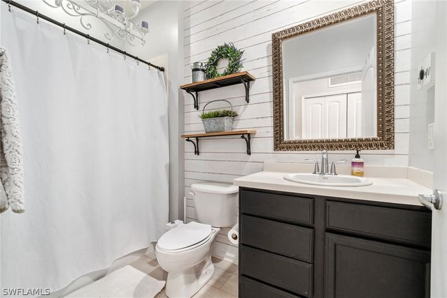 Bathroom with vanity and toilet | Image 26