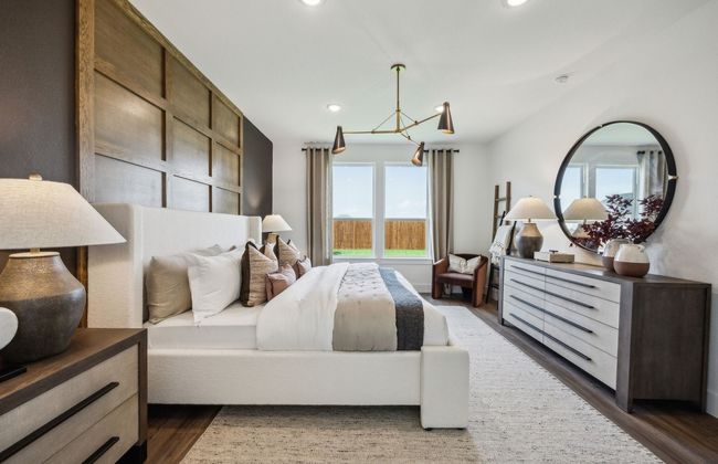 Spacious owner's suite bathed in natural light *Model representation | Image 18