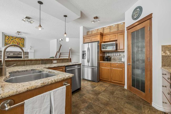 110 Tuscany Ridge Close Nw, Home with 4 bedrooms, 3 bathrooms and 2 parking in Calgary AB | Image 7