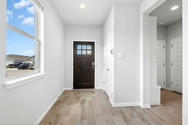 Foyer featuring light wood-type flooring and recessed lighting | Image 4