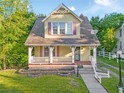 Victorian house featuring a front lawn and covered porch | Image 2