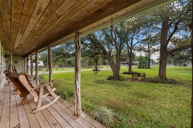Relax after a long day on your front porch and watch the sun set | Image 7