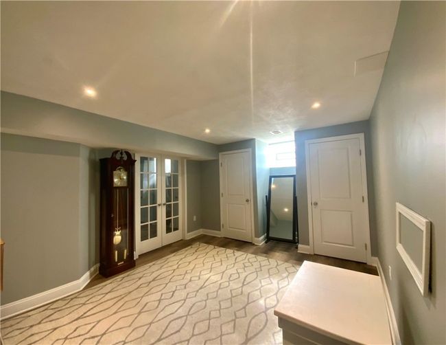 Versatile extra room ideal as a guest suite, home office or additional bedroom! | Image 20