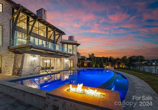 The pool exudes a luxurious, resort-worthy atmosphere, offering the ultimate retreat in your own backyard. | Image 45