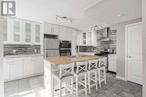 9-10401 19 St Sw, Calgary, AB, T2W3E7 | Card Image