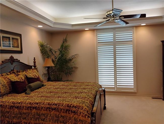Carpeted bedroom featuring recessed lighting and ceiling fan | Image 45