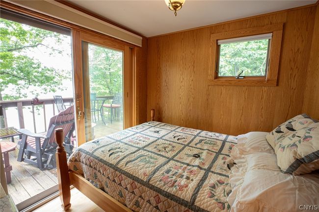 Deck accessible room, currently being used as a bedroom. | Image 29